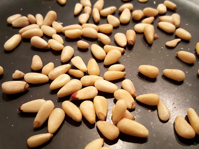 Spinaziestamppot met gebakken spekjes en zongedroogde tomaatjes